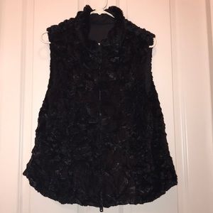 Reversible faux fur/puffer vest in black